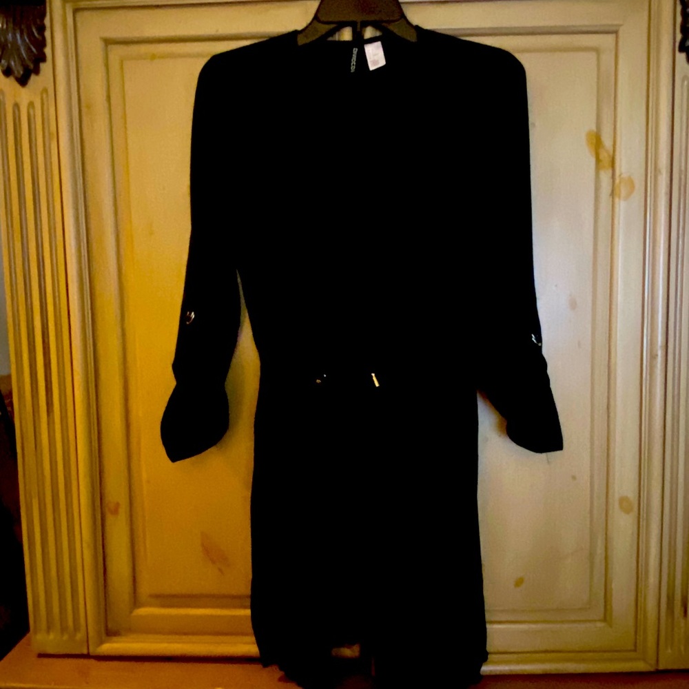 Black, knee length top